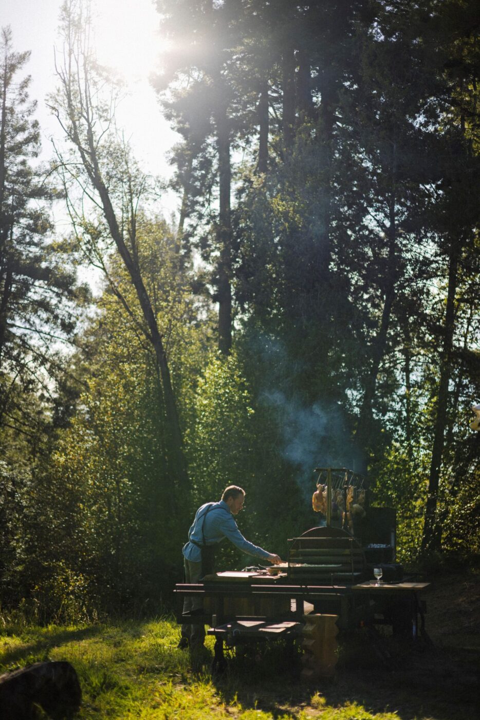 Chef Lee Desrosiers roasts whole chicken and cooks appetizers in his west county field kitchen. (Conor Hagen)