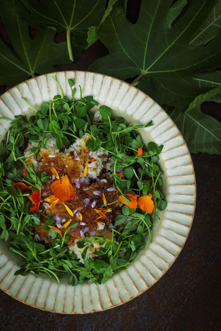 Crispy rice with fresh garnishes from chef Lee Desrosiers. (Conor Hagen)
