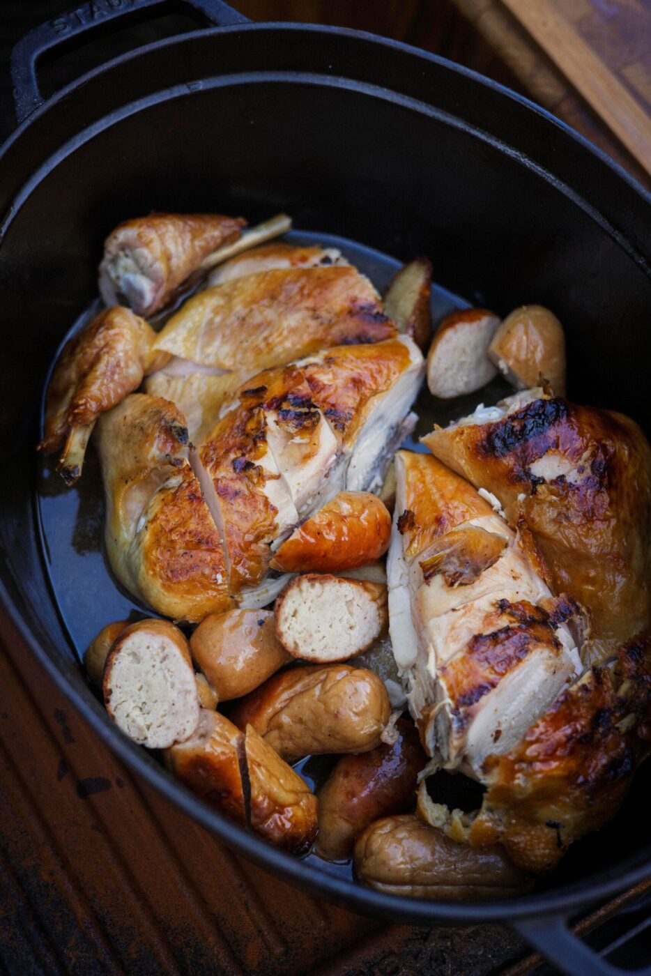 The signature dish at Lee Desrosiers' outdoor dinners is "Hell Chicken," cooked over an open fire, which Desrosiers says invites guests into the cooking process. (Conor Hagen)