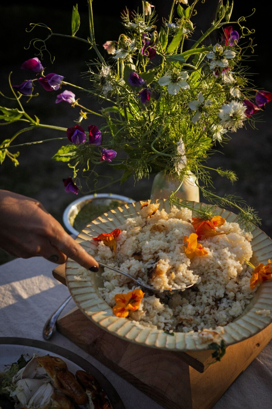 A skillet of rice cooked in schmaltz arrives brown and crunchy at the edges. (Conor Hagen)