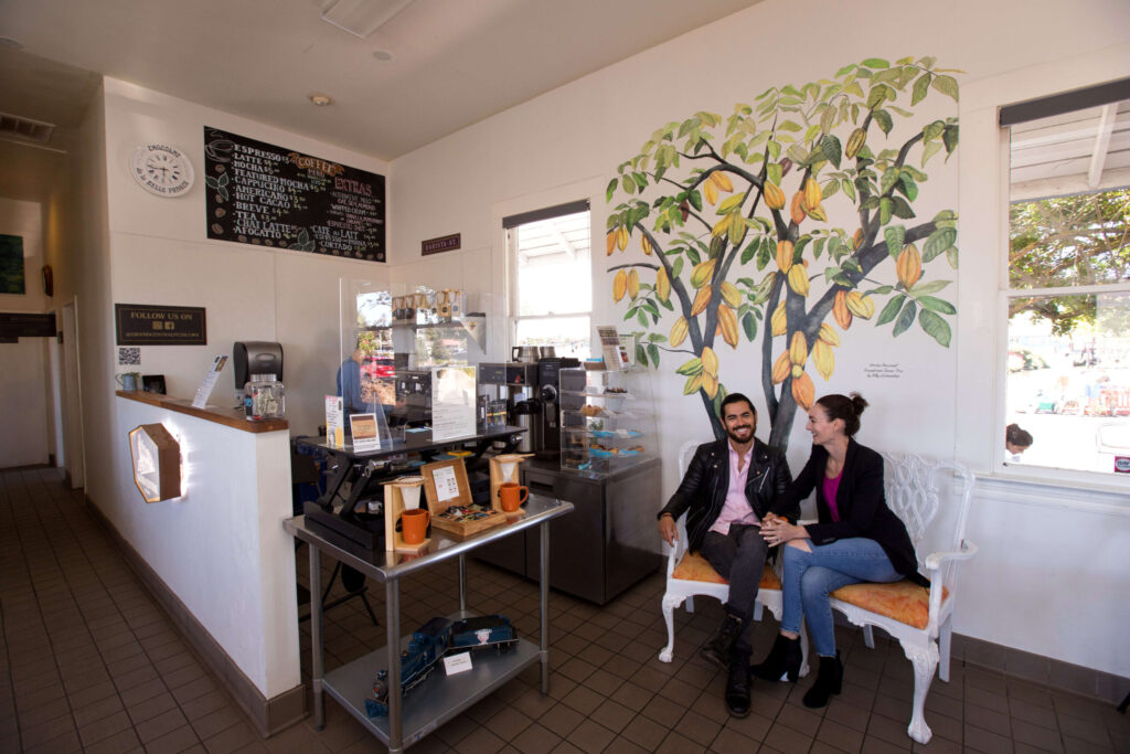 Owners, Natalie and Juan Carlos Vinueza, sit inside their cafe, Grand Central Petaluma, Saturday, July 9, 2022, in Petaluma. (Darryl Bush / For The Press Democrat)