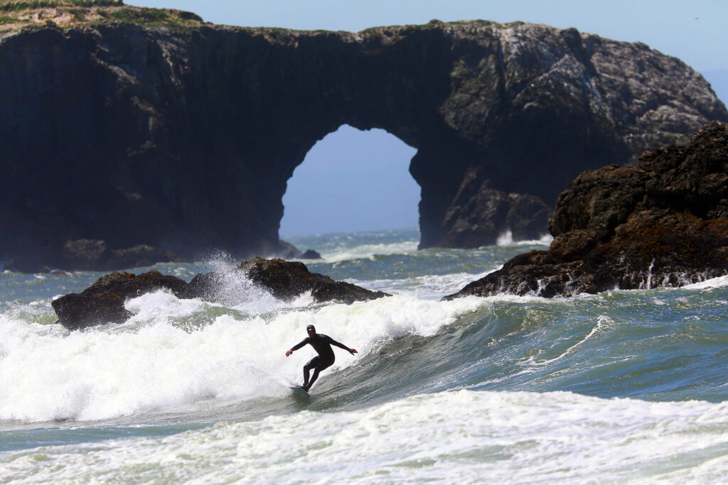 Surfer Dan Anderson of Carmel stopped during a road trip to Canada to try the waves on a windy day at Goat Rock State Park. (John Burgess/The Press Democrat)