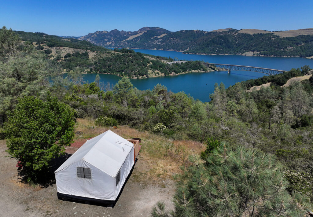A new glamping tent at The Ranch at Lake Sonoma offers a scenic view of the lake on Friday, May 22, 2026. (Christopher Chung/The Press Democrat)
