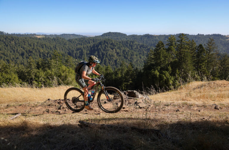 Amy Bush rides along the Sound of Music trail in the Monte Rio Redwoods Regional Park & Open Space Preserve near Occidental on Thursday, June 11, 2026. (Christopher Chung/The Press Democrat)