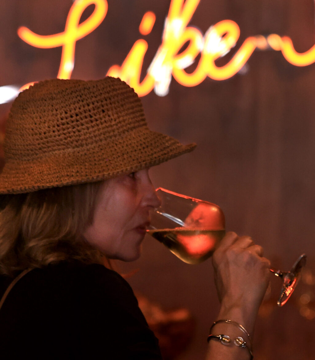 Nicole Herdman tastes a Vermentino, sourced from grapes from the Windmill Vineyard in Yolo County’s Dunnigan Hills at Benevolent Neglect Wines tasting room in Napa, Friday, July 24, 2026. (Kent Porter / The Press Democrat)