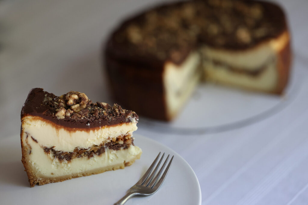 J.M. Rosen's Snickers Bar Cheesecake. Photo taken in Petaluma Tuesday, July 7, 2026. (Beth Schlanker / The Press Democrat)