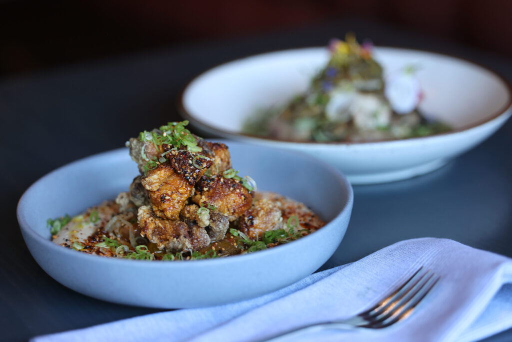 Chicken Karaage on a bed of tahini hummus at Dead Letter restaurant in Sonoma Wednesday, July 15, 2026. (Beth Schlanker / The Press Democrat)