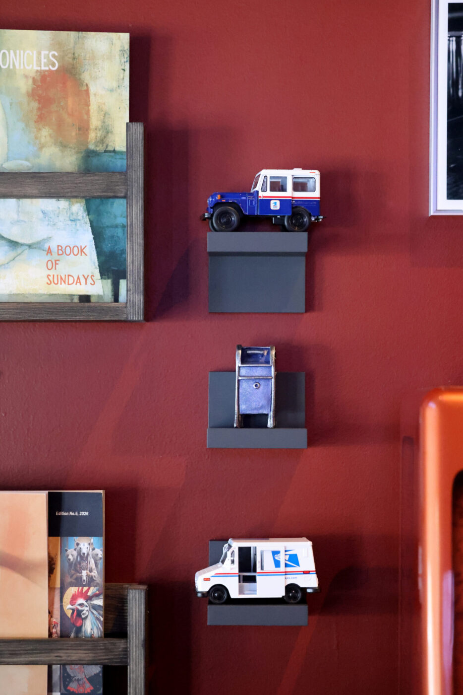Mail-themed decor decorated the wall at Dead Letter restaurant in Sonoma Wednesday, July 15, 2026. (Beth Schlanker / The Press Democrat)