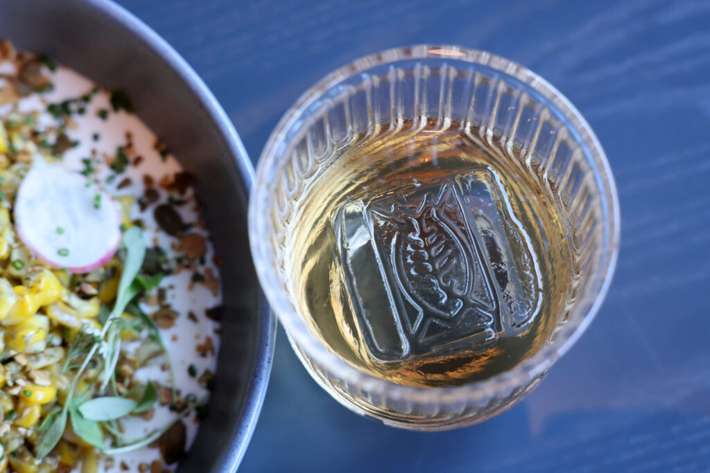 A custom stamped ice cube sits inside a Pale Note cocktail at Dead Letter restaurant in Sonoma Wednesday, July 15, 2026. (Beth Schlanker / The Press Democrat)