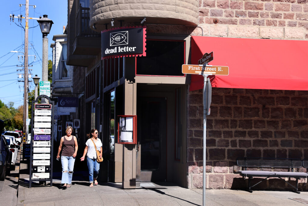 Pedestrians walk past Dead Letter restaurant at the corner of First St. E. and E. Napa St. in Sonoma Wednesday, July 15, 2026. (Beth Schlanker / The Press Democrat)