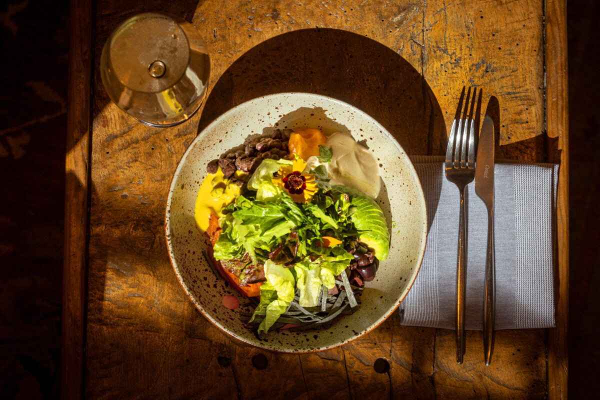 California Sunshine Bowl with mixed grain rice, black beans, smoky glazed Carrots, avocado, carrot, queso, sour cream, Magical Green sauce, Kalamata olives, blue corn tortilla strips, chickpea vinaigrette and cilantro-mint salad from Little Saint in Healdsburg. (John Burgess/The Press Democrat)