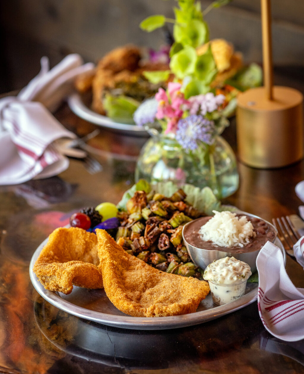 Crispy Fried Catfish with okra and red beans and rice from Saucy Mama’s Jook Joint Friday, July 18, 2026 in Guerneville. (John Burgess/The Press Democrat)