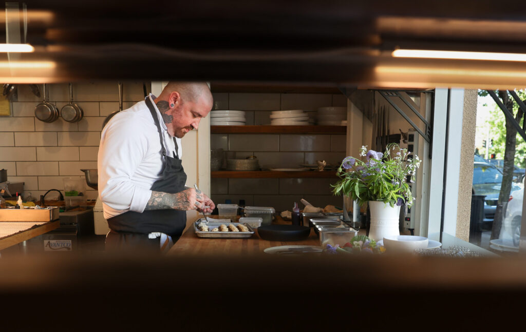 Troubadour Bread & Bistro chef de cuisine Daniel Walsh puts together canapes in Healdsburg on Thursday, July 2, 2026. (Christopher Chung/The Press Democrat)
