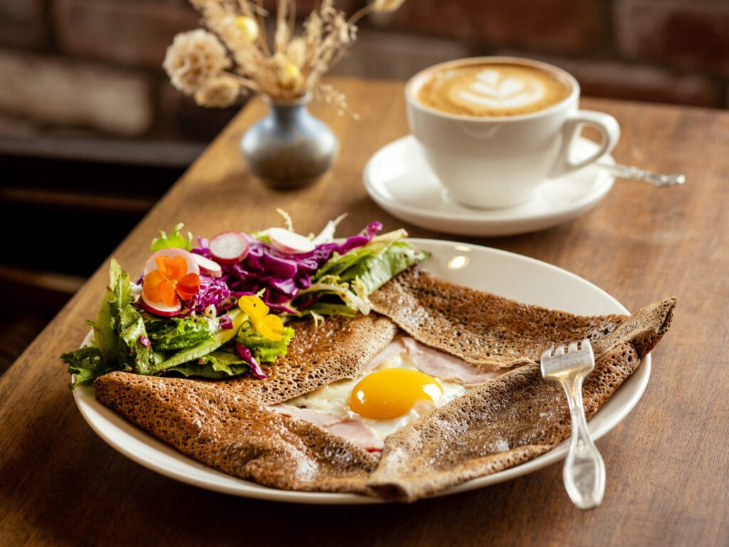 The Complete Buckwheat Crepes with ham, mild Emmentaler cheese and a sunny-side-up egg from Sarmentine Bakery Petaluma Thursday, May 7, 2026. (John Burgess/The Press Democrat)