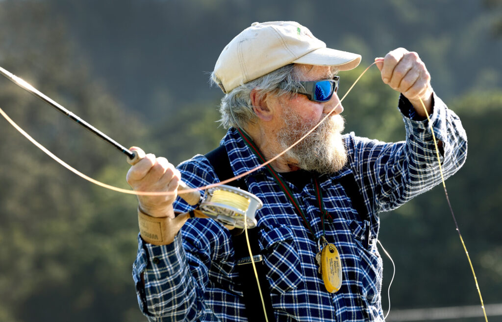 The Russian River Fly Casters member Doug Mackay practices for a fishing trip to Mexico Thursday, May 7, 2026 at the casting pond in Galvan Park in Santa Rosa. (John Burgess/The Press Democrat)