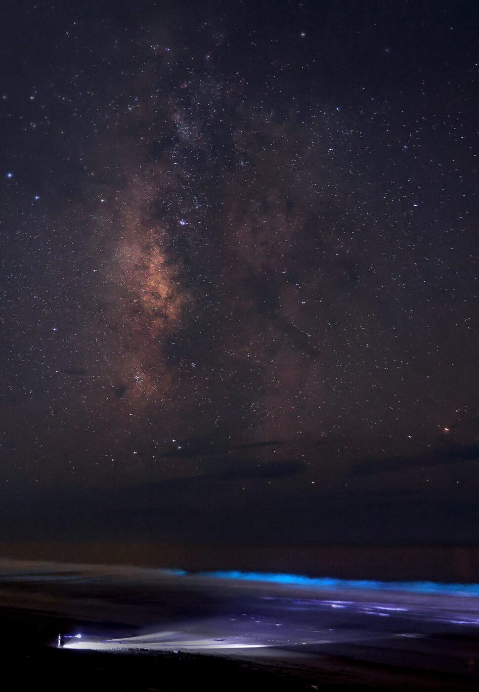 At Salmon Creek Beach north, the Milky Way and ocean bioluminescence make for a visual feast for a visitor, Wednesday, Sept. 24, 2025. Sea Surface Temperatures are running above normal giving glowing dinoflagellate plankton a canvas in which to glow. The phenomenon is most common during fall months in the Bay Area ocean waters. (Kent Porter / The Press Democrat)