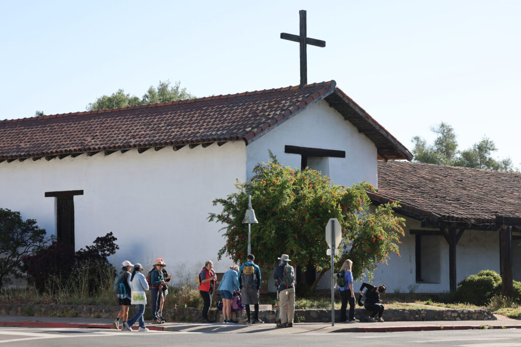 Hikers meet at Sonoma Plaza before embarking on the Camino de Sonoma. Photo taken in Sonoma on Thursday, May 14, 2026. (Beth Schlanker / The Press Democrat)