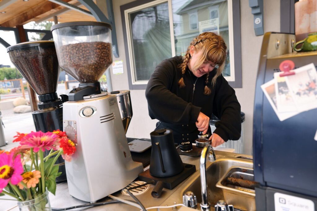 Graton Station employee Bri Fischer makes espresso drinks in Graton Sunday, Aug. 16, 2026. (Beth Schlanker / The Press Democrat)