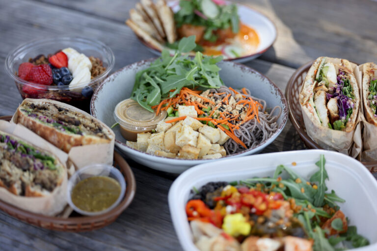 A variety of bowls and sandwiches, including a soba noodle bowl with tofu, arugula, carrots, peanuts, edamame and a red curry peanut dressing at Wylde Provisions Co. in Sebastopol Sunday, Aug. 23, 2026. (Beth Schlanker / The Press Democrat)