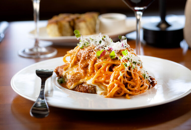Chicken Parmesan topped with spaghetti, pomodoro, bechamel, Parmesan and fresh herbs from Capriciano Osteria Thursday, July 30, 2026 in Santa Rosa. (John Burgess/The Press Democrat)