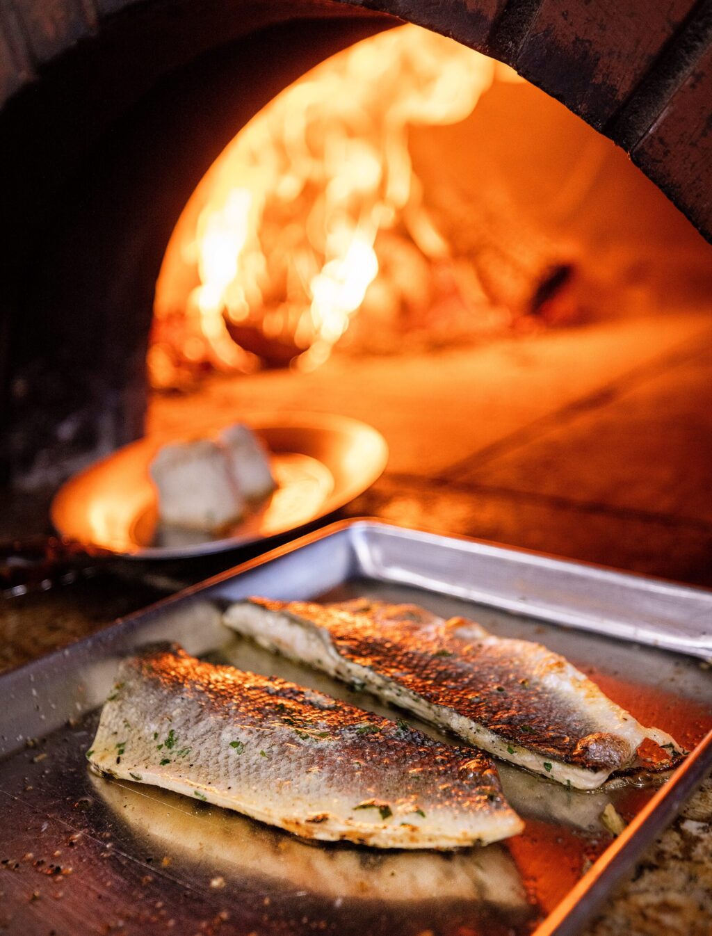 Wood-fired Petrale Sole for the daily special at Capriciano Osteria Thursday, July 30, 2026 in Santa Rosa. (John Burgess/The Press Democrat)