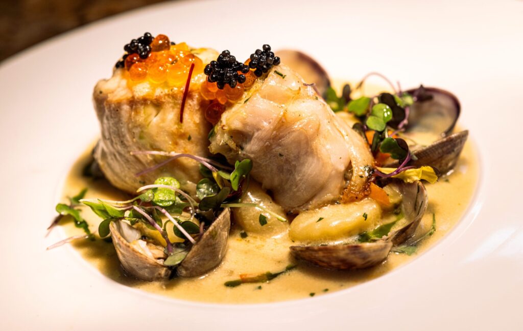 The daily special of Petrale Sole with Crab and Caviar with clams from Capriciano Osteria Thursday, July 30, 2026 in Santa Rosa. (John Burgess/The Press Democrat)