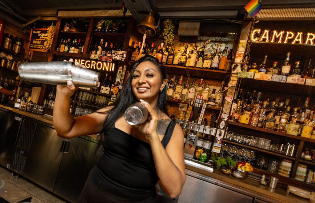 Bartender Marilyn Rodriguez shakes up cocktails for lunch at Lo & Behold Monday, Aug. 3, 2026 in Healdsburg. (John Burgess/The Press Democrat)