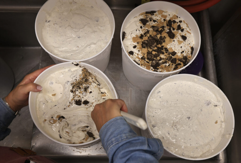 Screamin' Mimi’s Maraline “Mimi” Mazzetti Olson, mixes up a batch of Cookie Break ice cream, Wednesday, August 12, 2026, in Sebastopol. (Kent Porter / The Press Democrat)