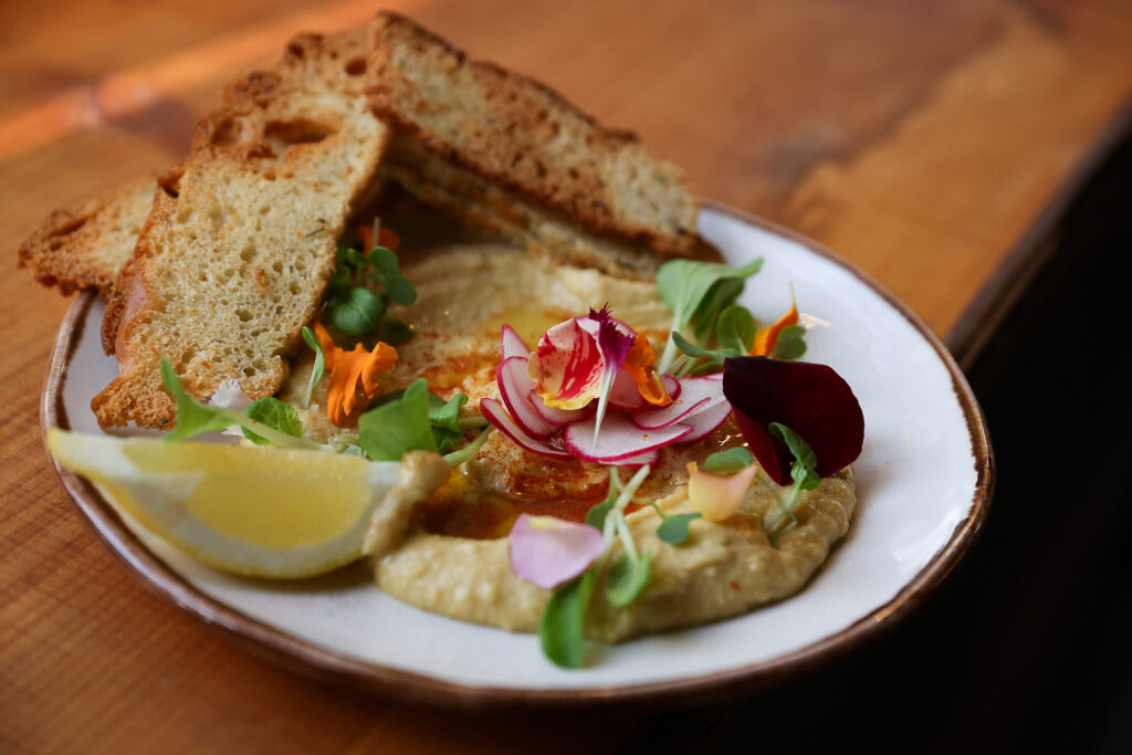 A hummus plate at The Porch Kitchen in Sebastopol on Thursday, August 20, 2026. (Christopher Chung/The Press Democrat)