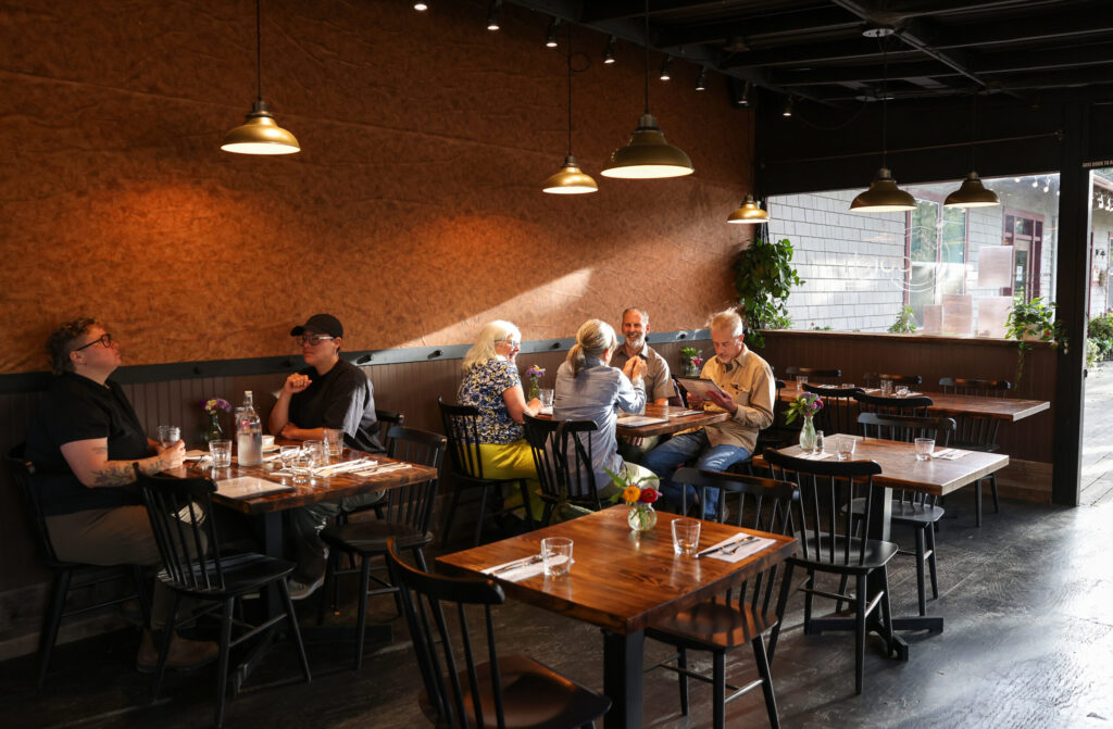 The indoor dining room at The Porch Kitchen in Sebastopol on Thursday, August 20, 2026. (Christopher Chung/The Press Democrat)