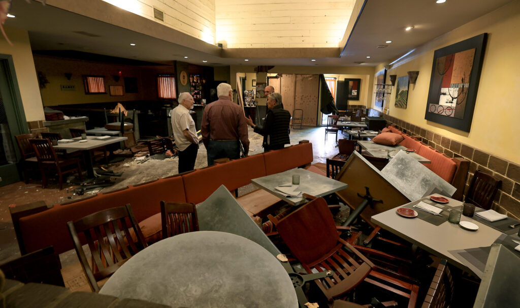 Debris remains after a vehicle plowed through Baci Cafe and Wine Bar Saturday morning. On Tuesday, May 26, 2026, owner Lisbeth Holmefjord discuss rebuilding options. (Kent Porter / The Press Democrat)