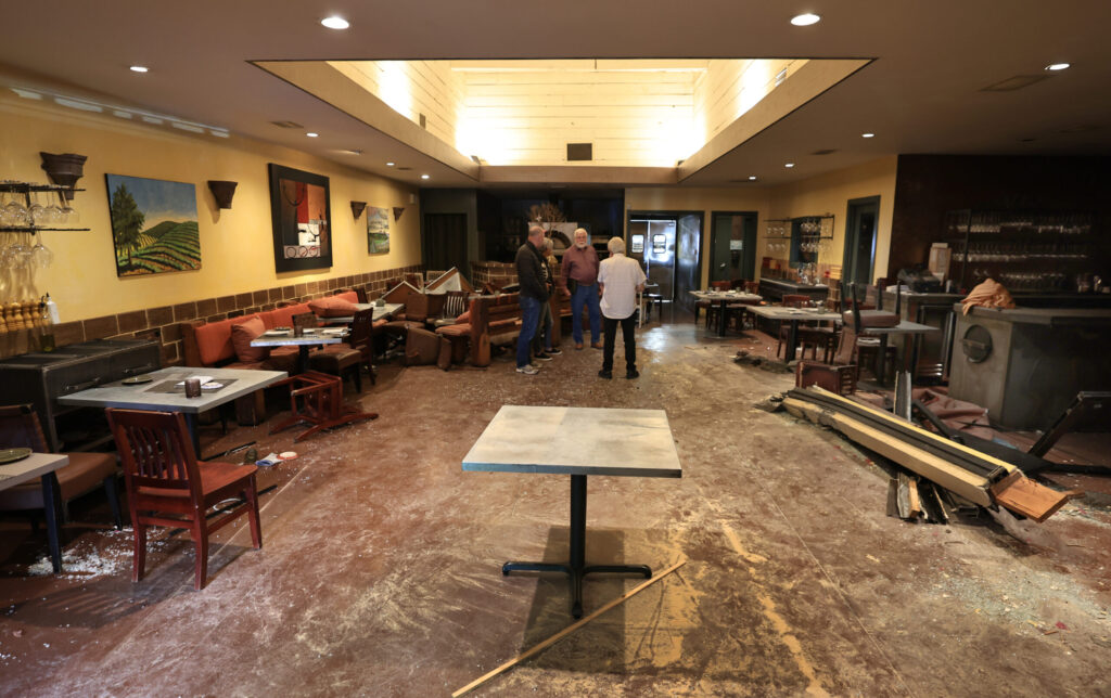 Debris remains after a vehicle plowed through Baci Cafe and Wine Bar Saturday morning. On Tuesday, May 26, 2026, owner Lisbeth Holmefjord discuss rebuilding options. (Kent Porter / The Press Democrat)