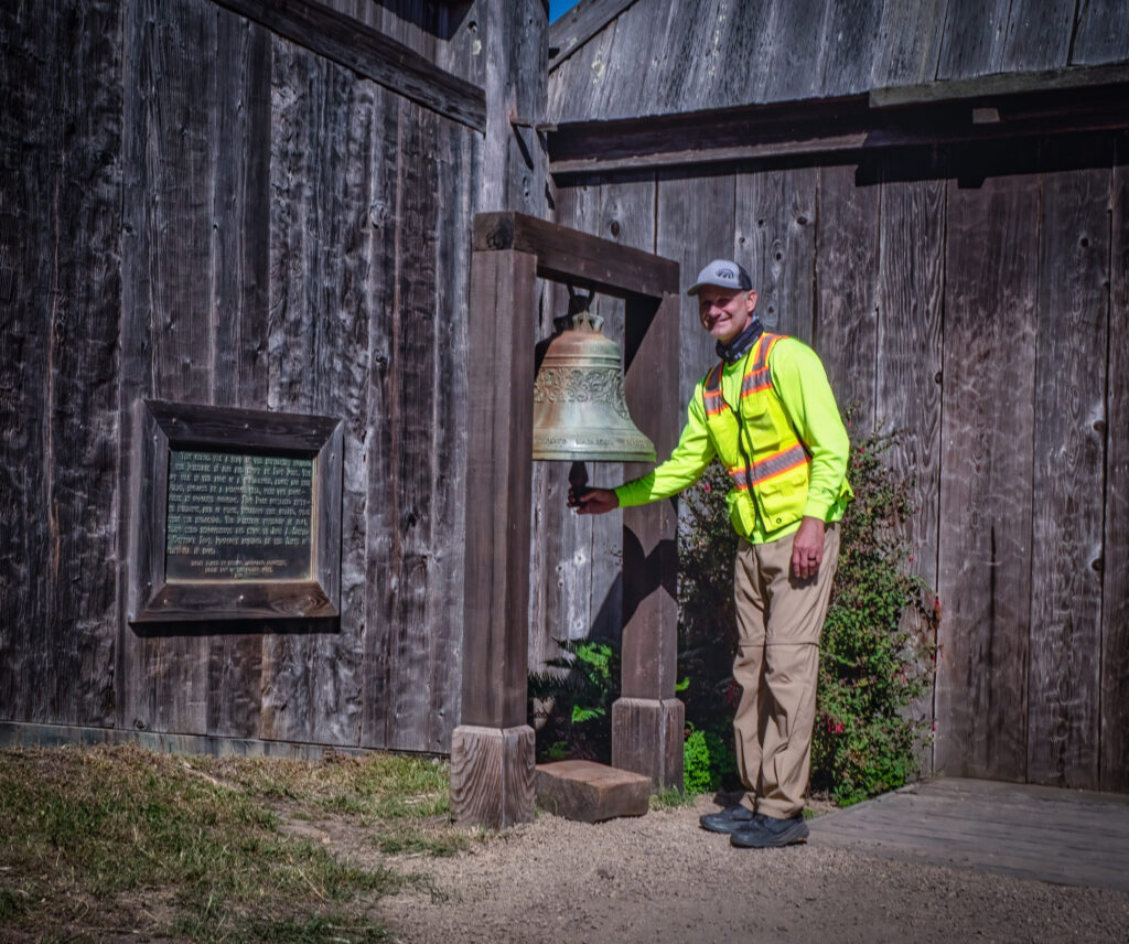 Tony "Camino" McCormick rings the chapel bell at Fort Ross. (Sam Mills)