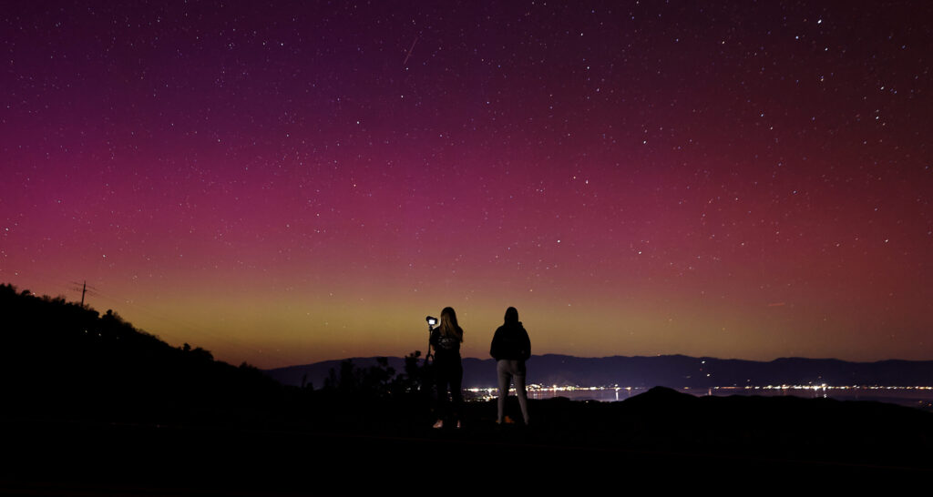 A view of Clear Lake from the Hopland grade as a pair of photographers capture an aurora borealis in May 2024.