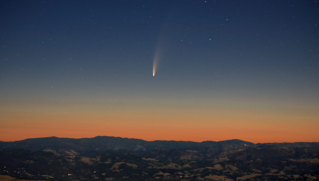 Comet NEOWISE displays its own July fireworks as a trail of dust and gas follow the arc of the comet in the pre-dawn sunrise above the Mayacamas Mountains of Sonoma and Lake Counties, Wednesday, July 8, 2020. NEOWISE will be visible just before early dawn in the low northeast sky until July 12, and will then be visible at dusk beginning July 13 on the low northwest horizon. (Kent Porter / The Press Democrat) 2020