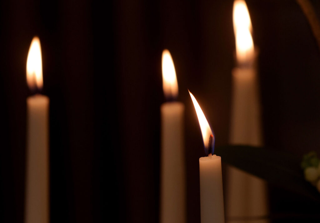 Candles are lit before sunset to usher in Rosh Hashanah at Sonoma County Chabad Jewish Center, Friday, September 15, in Santa Rosa. (Darryl Bush / For The Press Democrat)