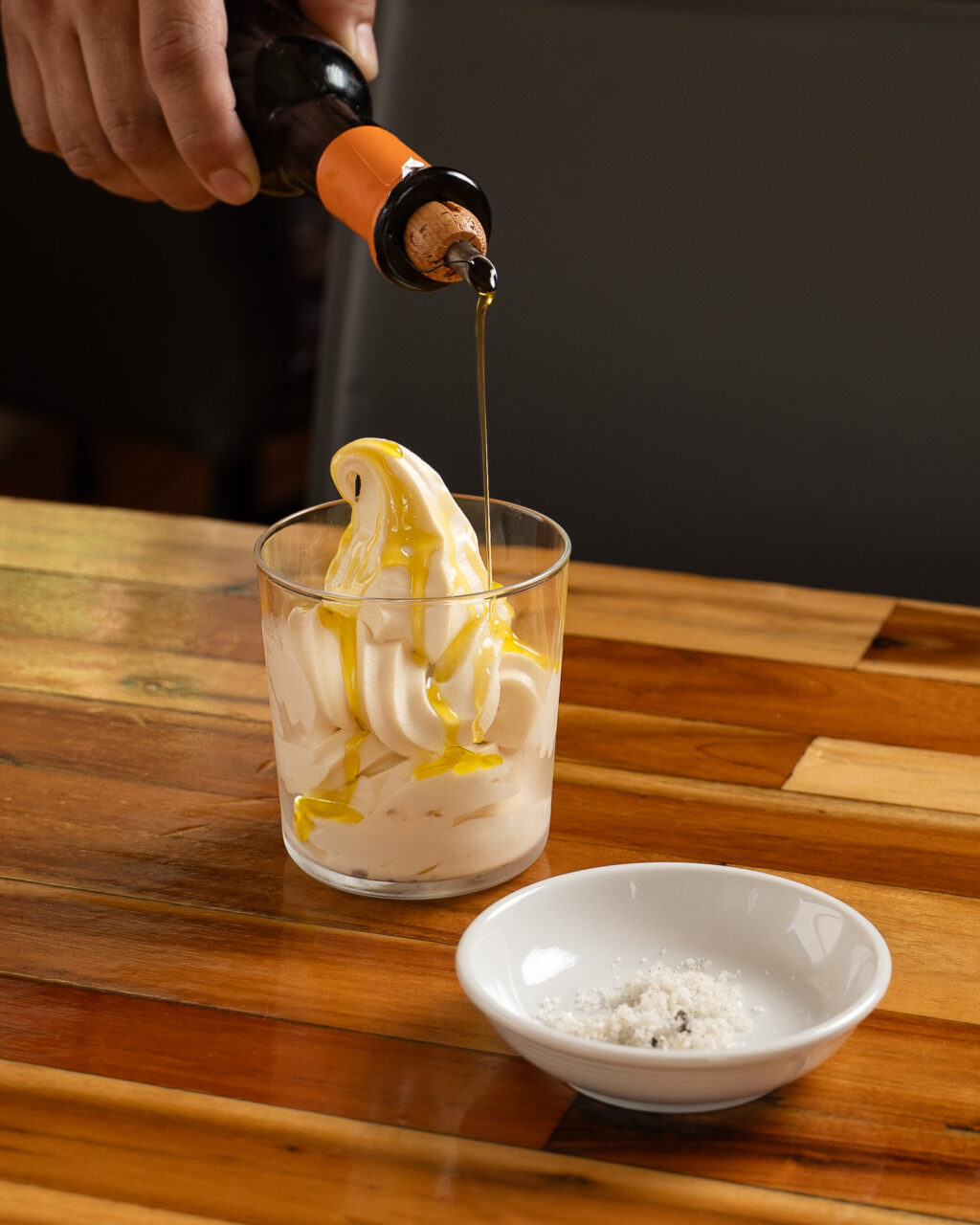 Bravas offers vanilla soft serve with tangerine oil and sea salt on its dessert menu. (Bravas)