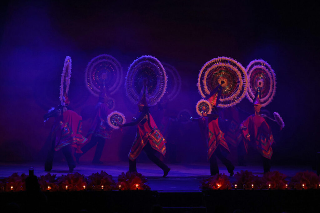Dancers perform “Danza de los Quetzales” from the state of Puebla, Mexico during the Mictlan: A Dia de los Muertos Concert at the Sebastiani Theatre in Sonoma Sunday, Oct. 5, 2025. (Beth Schlanker / The Press Democrat)