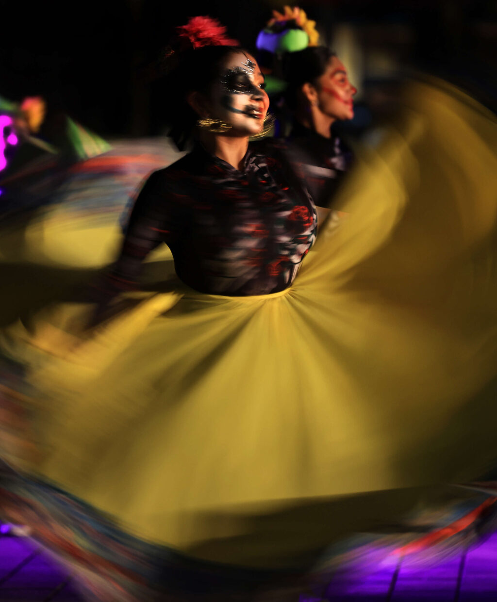 Ballet Folklorico Netzahualcoyotl performs at twilight during Santa Rosa's 24th Annual Dia de los Muertos celebration, Saturday, Nov. 2, 2024 at Old Courthouse Square. (Kent Porter / The Press Democrat)